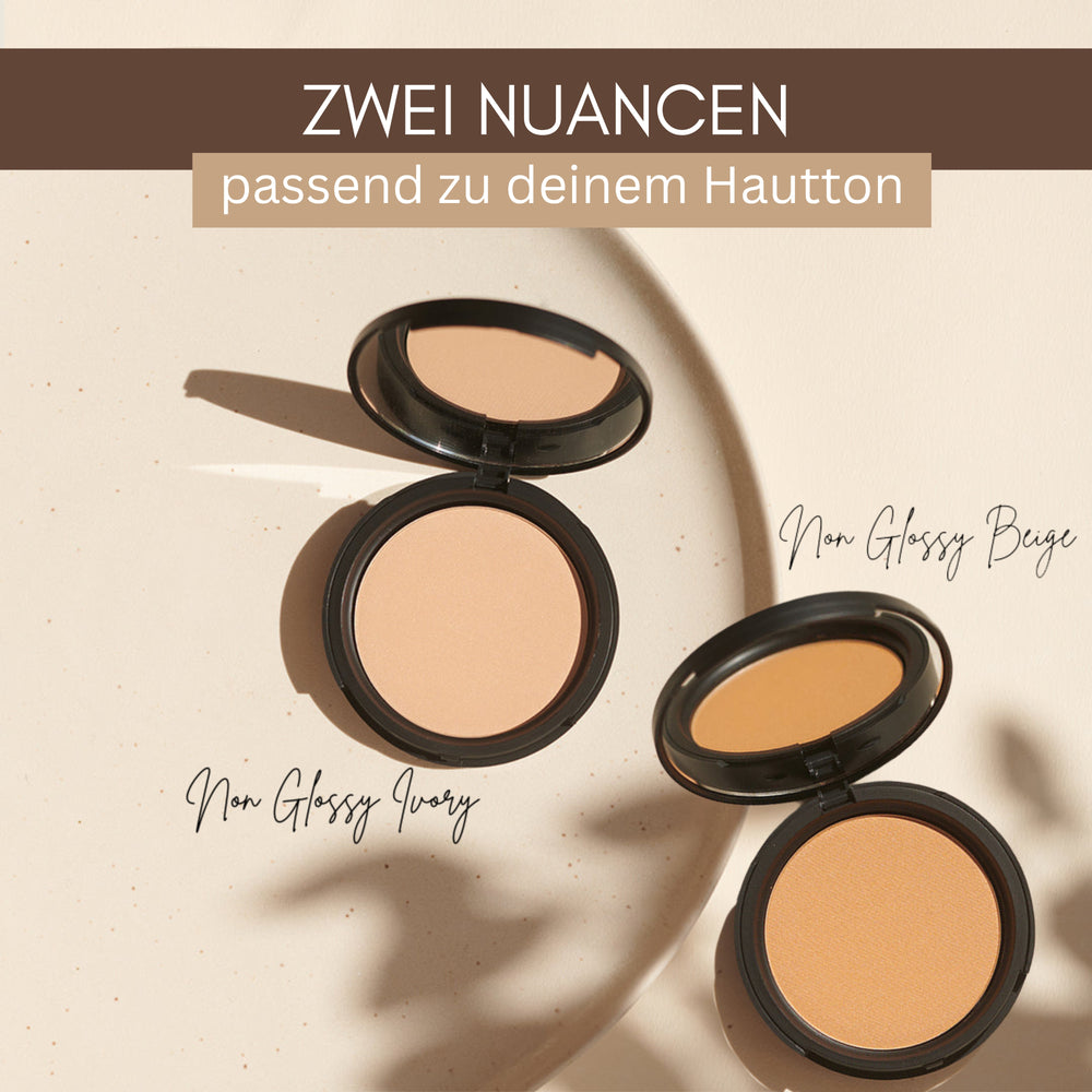 Zwei offene Puderdosen mit den Bezeichnungen Non Glossy Ivory und Non Glossy Beige von Thats me Organic®, mit Bio-Puder für eine vegane Formel und mattierende Wirkung, auf hellem Hintergrund.