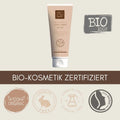 Beige Tube der Thats me Organic® aloe Handcreme mit der Aufschrift Bio-Naturkosmetik, mit Symbolen für biologisch, tierversuchsfrei, chemiefrei, zertifiziert natürlich und angereichert mit Hyaluron für zusätzliche Feuchtigkeit.