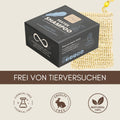 Thats me Organic® schwarze Schachtel festes Shampoo mit Symbolen für chemikalienfrei, grausamkeitsfrei, biologisch abbaubar & 100% natürlich; Text: Frei von Tierversuchen. Ideal für sensibles Haar.